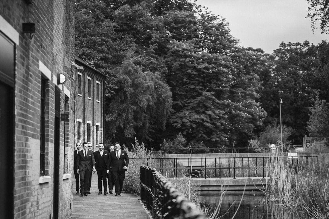 groom and ushers arrive at bombay sapphire distillery for the wedding
