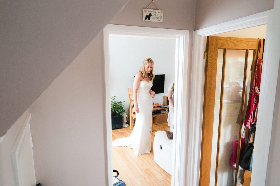 last minute checks before the bride leaves home for the wedding ceremony